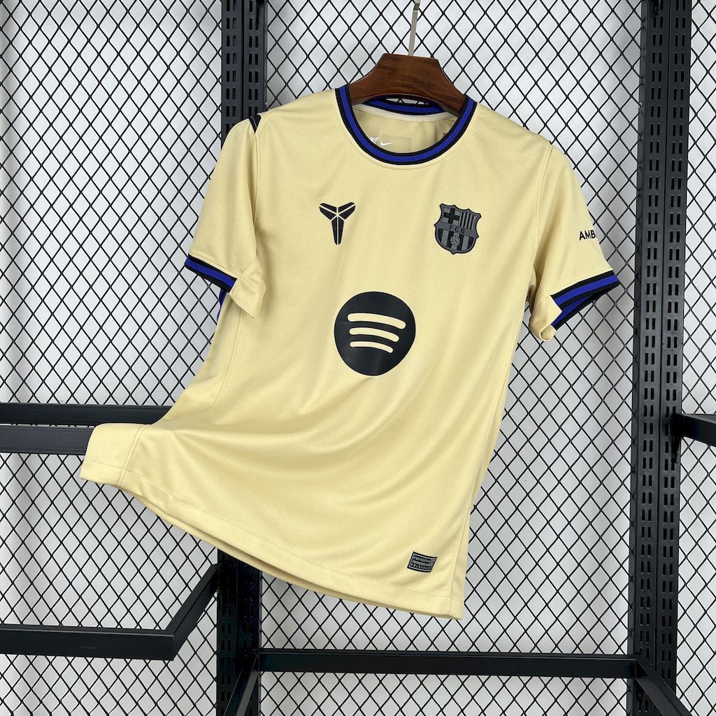 FC Barcelona 2025/26 away fan jersey, light yellow with blue trim and front crest