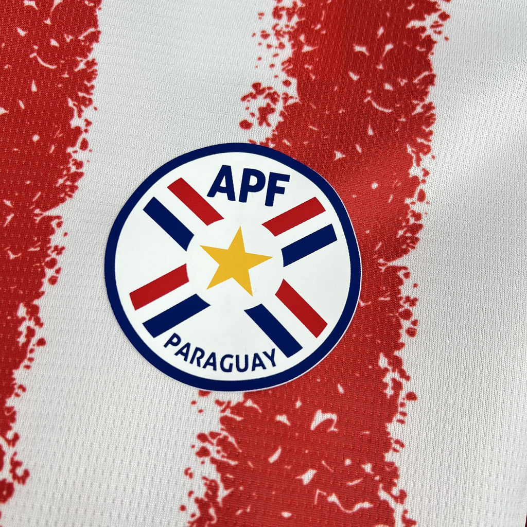 Paraguay home fan jersey crest badge on chest with APe Paraguay logo on red stripe