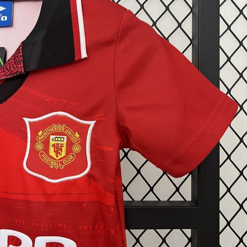 Red kid soccer jersey sleeve with Manchester United crest