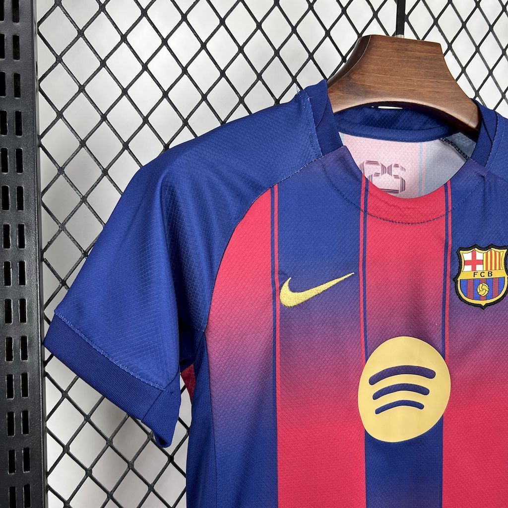 Kids FC Barcelona home jersey front: blue with red-blue stripes, Spotify logo and club crest