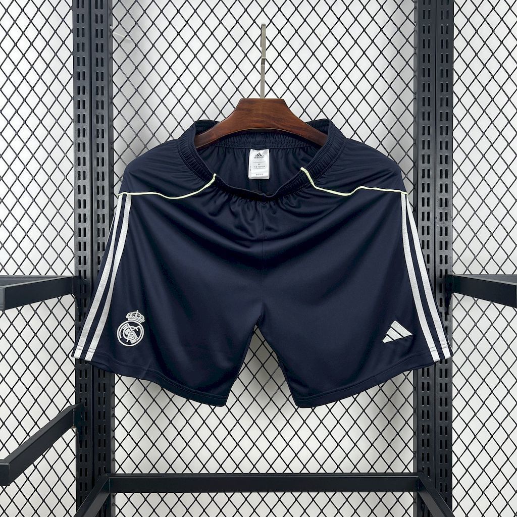 Navy fan shorts with light green piping, Real Madrid crest, and side stripes