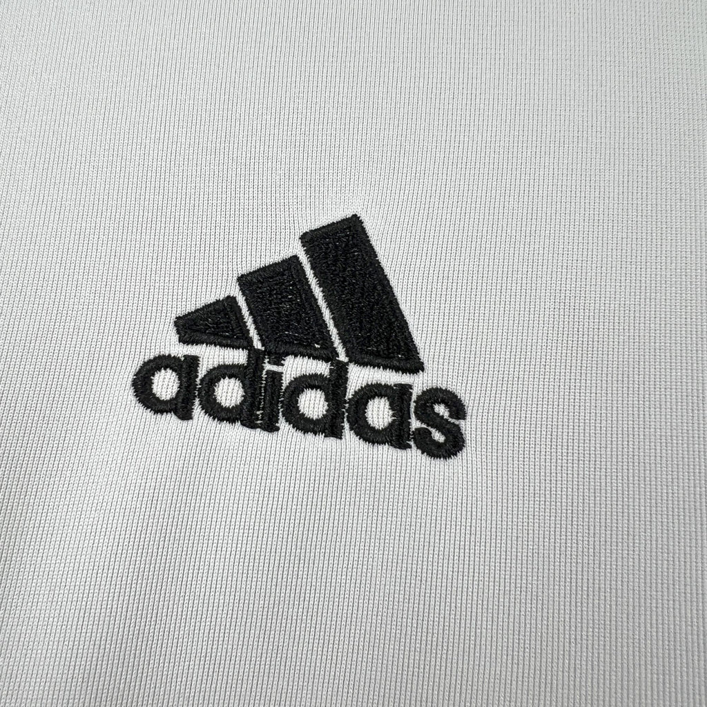 adidas logo on black-and-white retro soccer jersey
