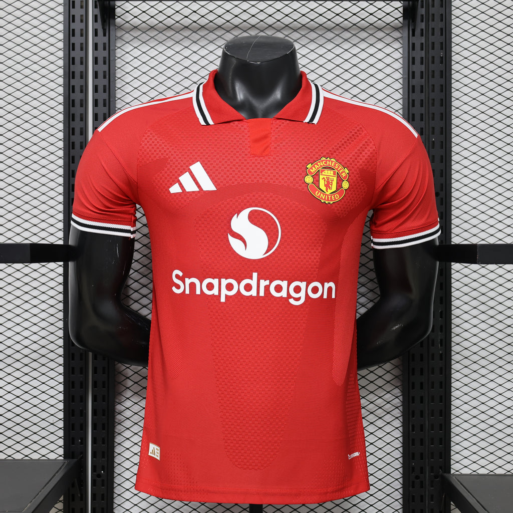 Red Manchester United home player football shirt, adidas logo, Snapdragon sponsor