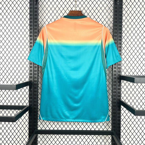 Fan soccer jersey back view in teal-to-orange gradient with Australia crest and Nike details