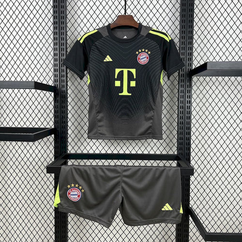 Kids black goalkeeper jersey and shorts set with neon yellow accents and club badge