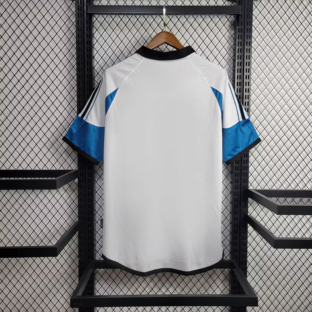 White retro football jersey back view with blue sleeve panels and black adidas collar