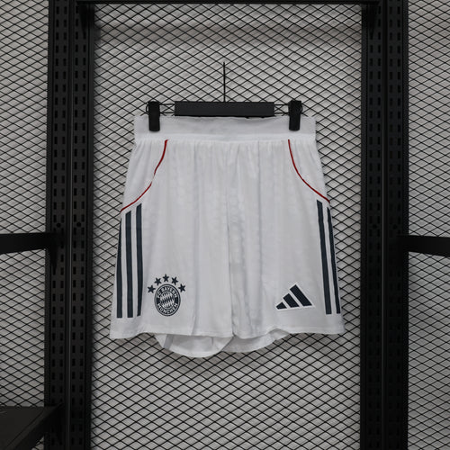 White away player shorts with red piping and black side stripe accents