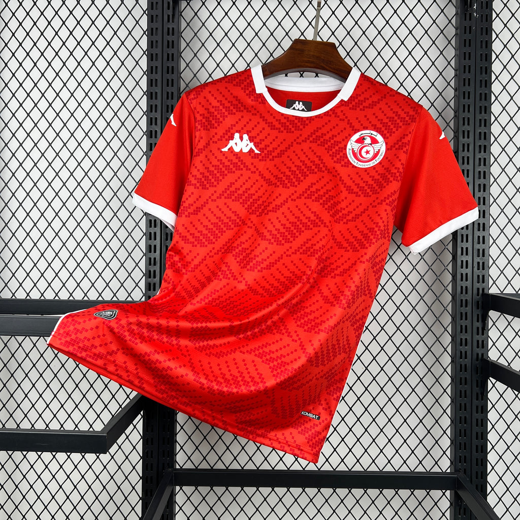 Red Tunisia home football jersey with white collar and round crest on chest