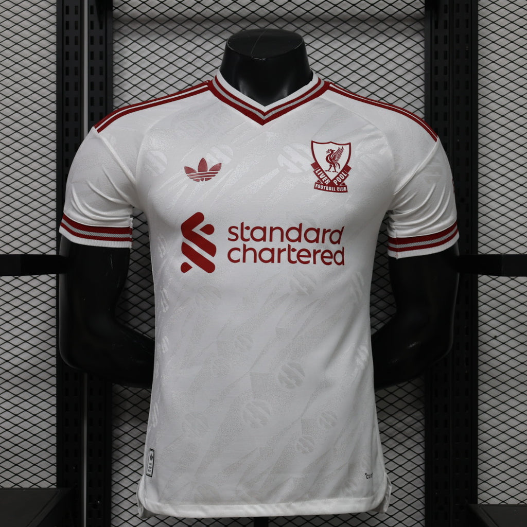 Liverpool FC away player jersey, white with red trim and standard chartered sponsor