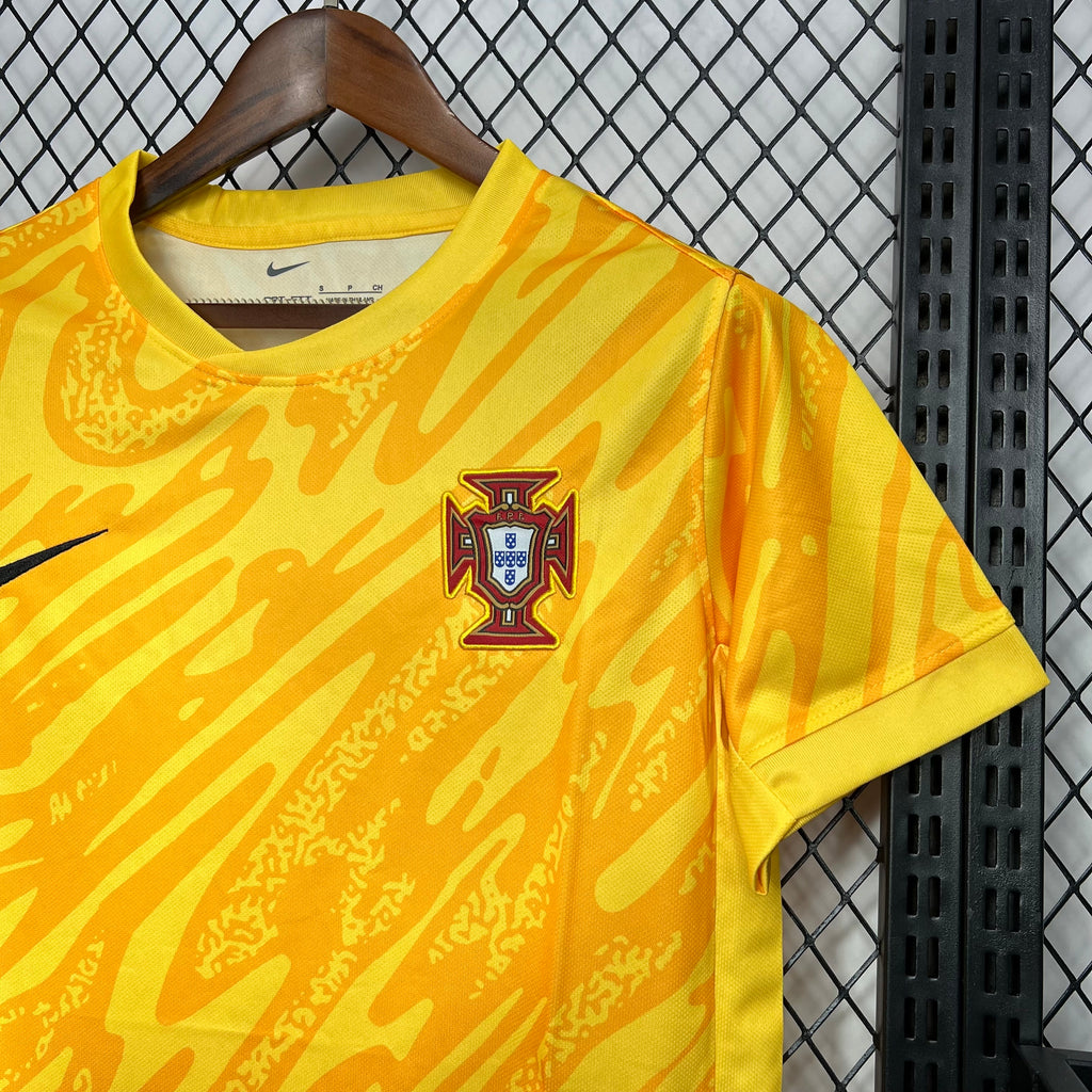 Yellow Portugal goalkeeper jersey with crest centered on chest and Nike swoosh detail