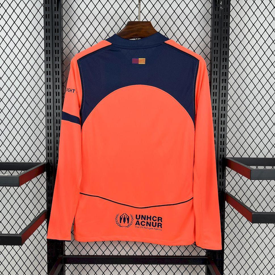 Navy and orange long-sleeve football jersey back with UNHCR ACNUR logo