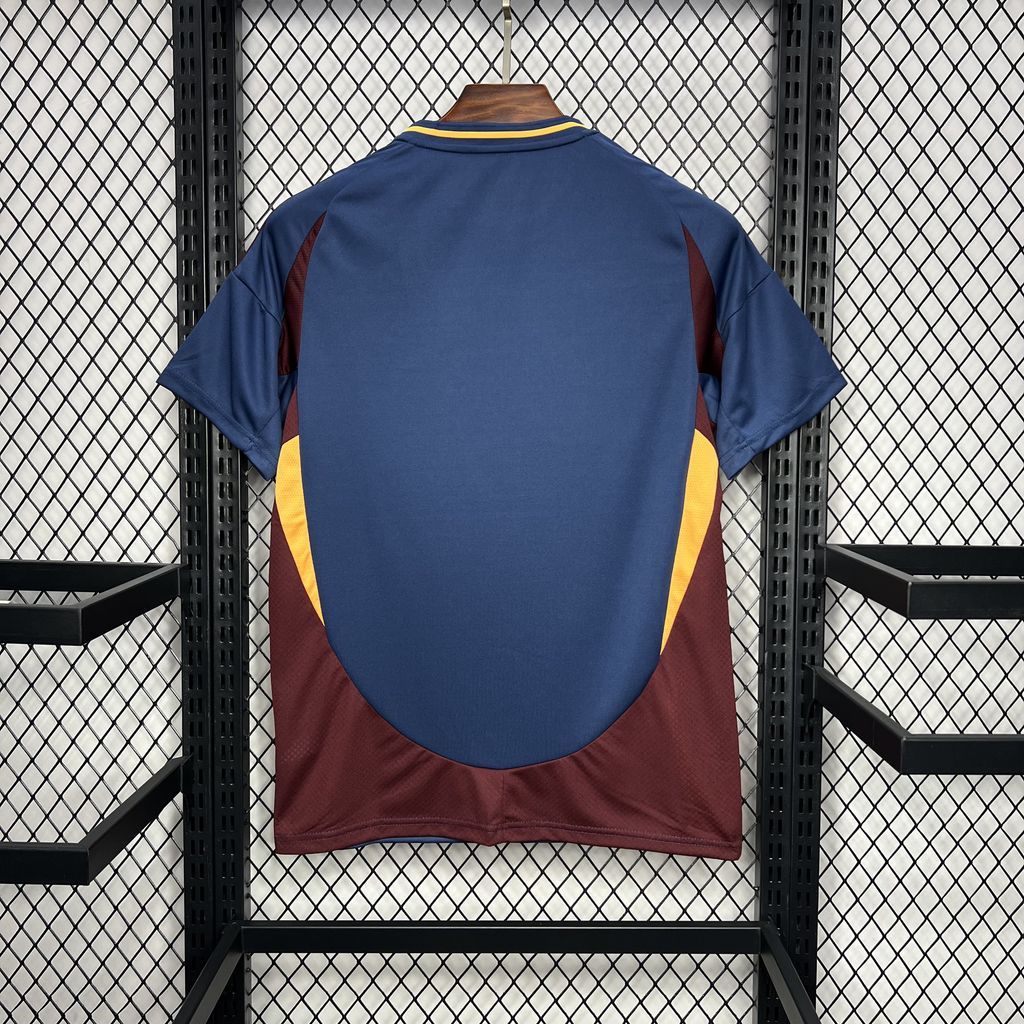 Blue soccer fan jersey back view with maroon side panels and yellow piping