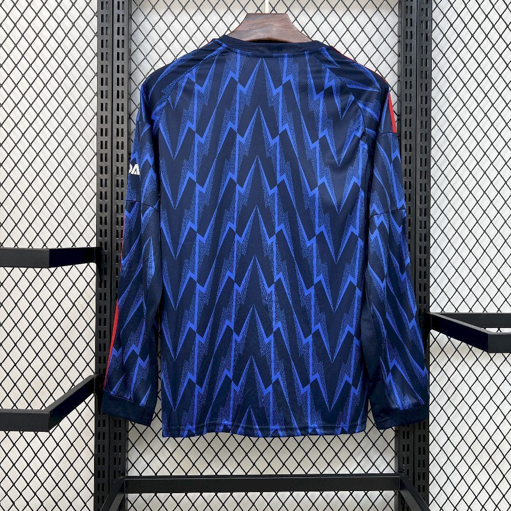 Blue away long-sleeve fan jersey with full zigzag pattern and red side trim