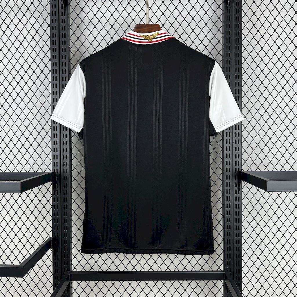 Black football jersey back with black vertical stripe pattern and striped collar