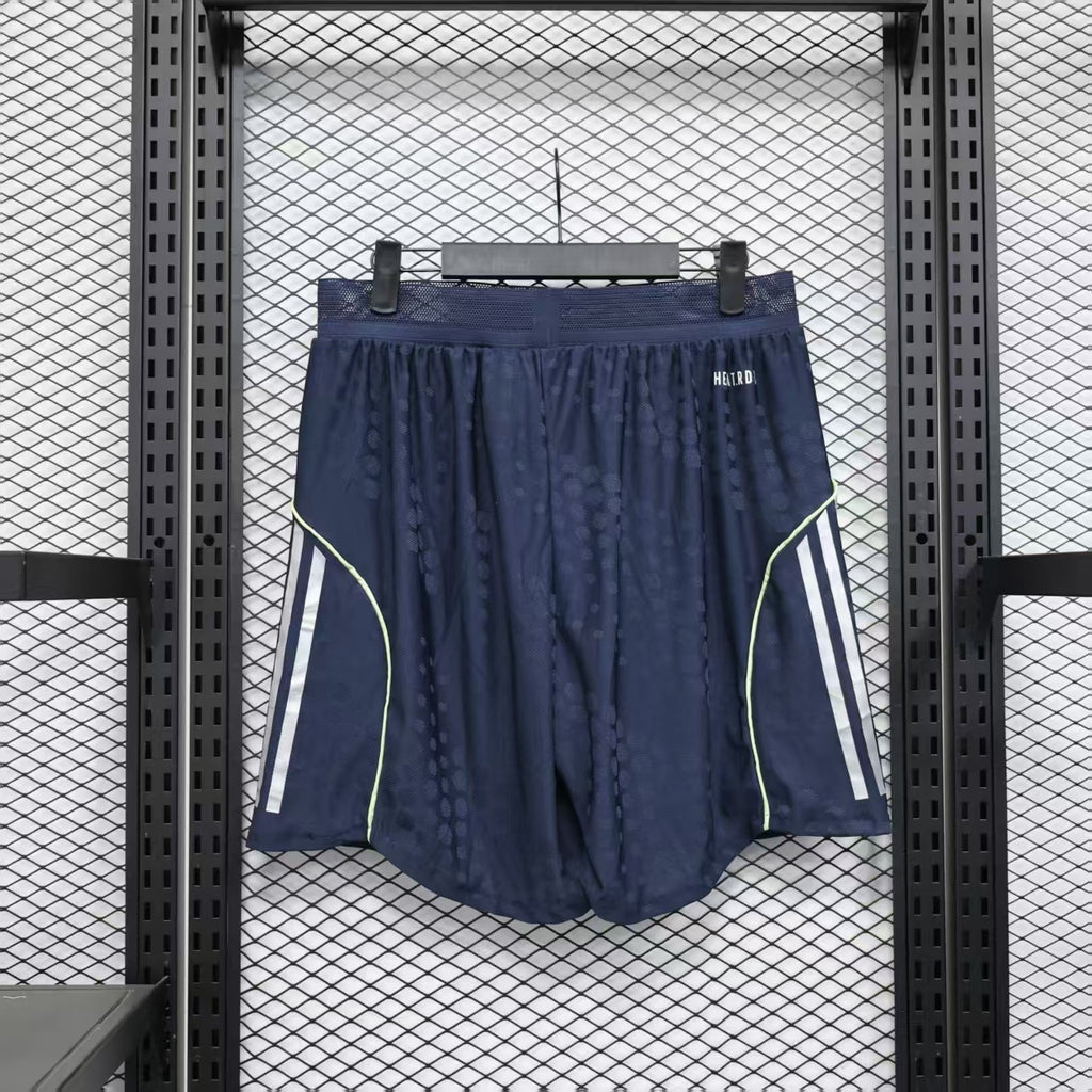 Navy player shorts front view with elastic waist, lime piping, and white adidas side stripes