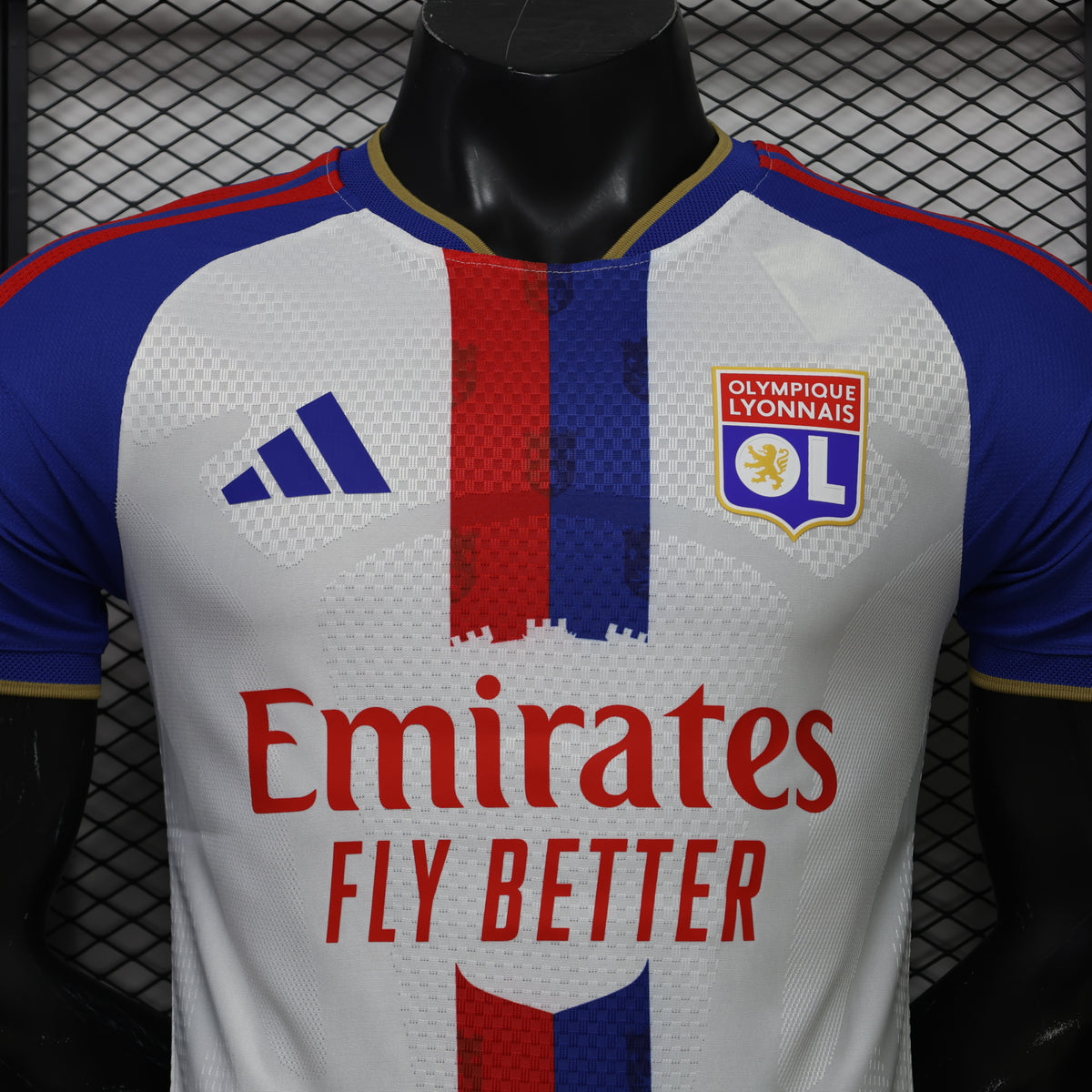 Home football shirt front, white with blue sleeves, red stripe, Emirates Fly Better