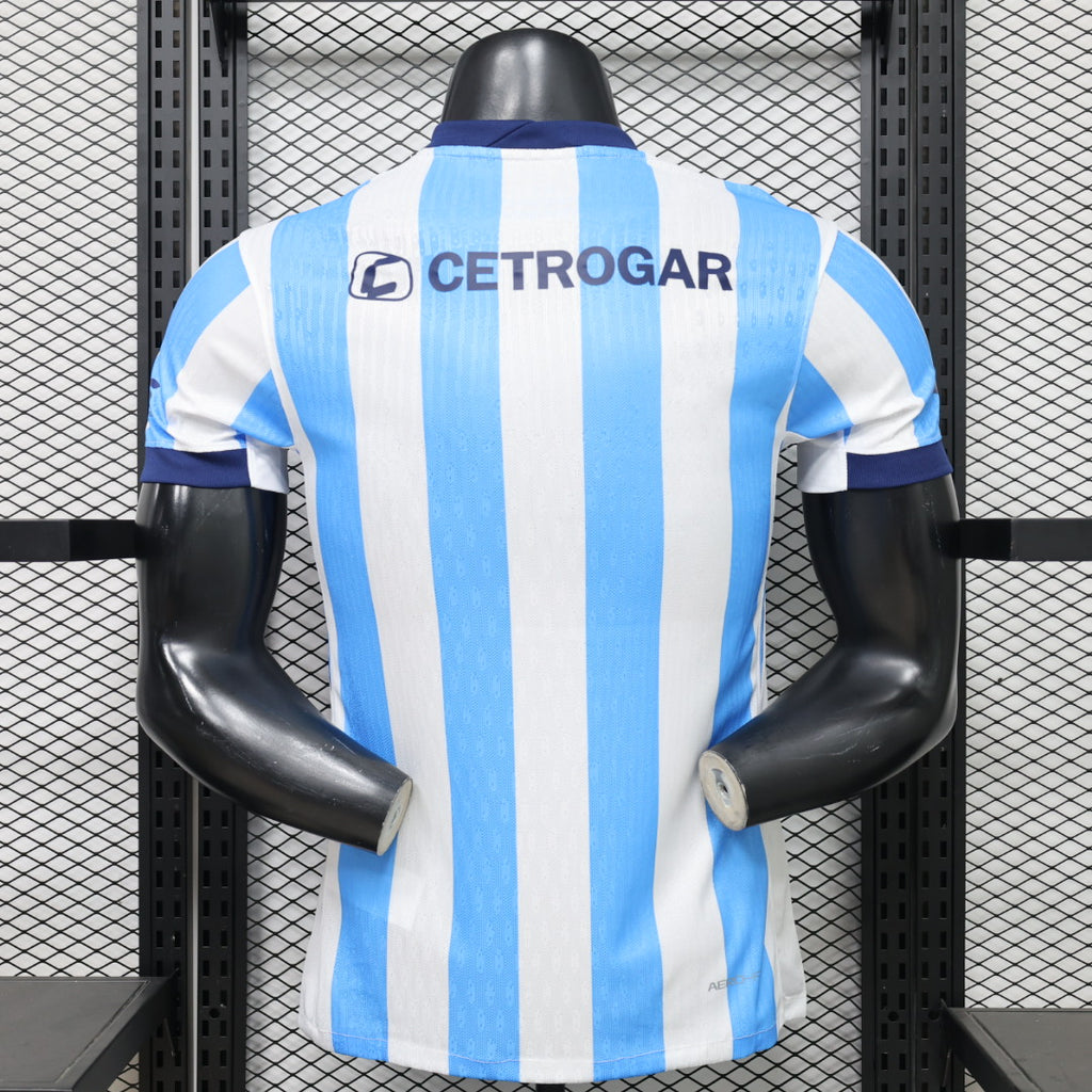 Blue-and-white striped soccer jersey with 'CETROGAR' sponsor and back crest on mannequin