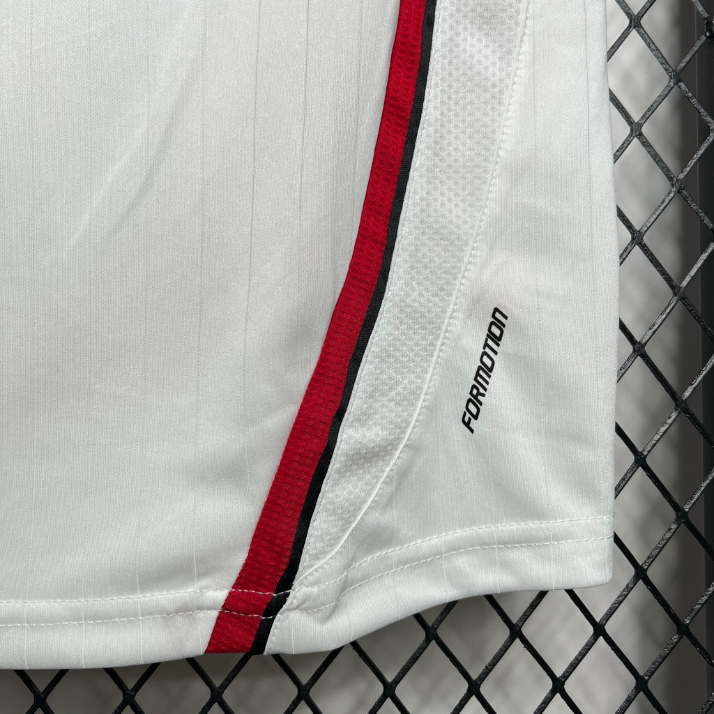 White away soccer jersey sleeve seam with red stripe and FORMotion text