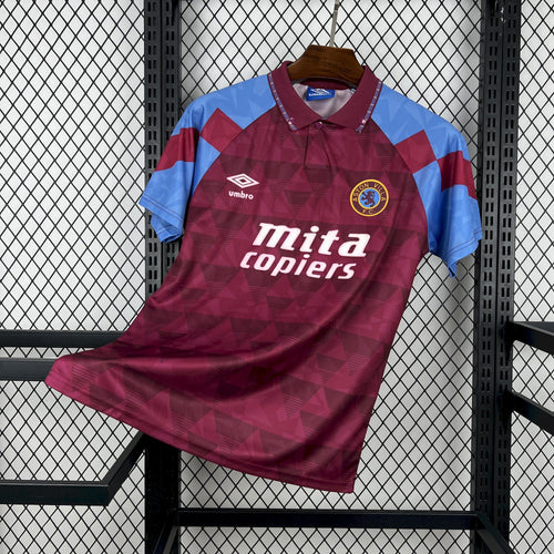 Maroon and light-blue retro home football shirt with Aston Villa badge and Mitza copiers print