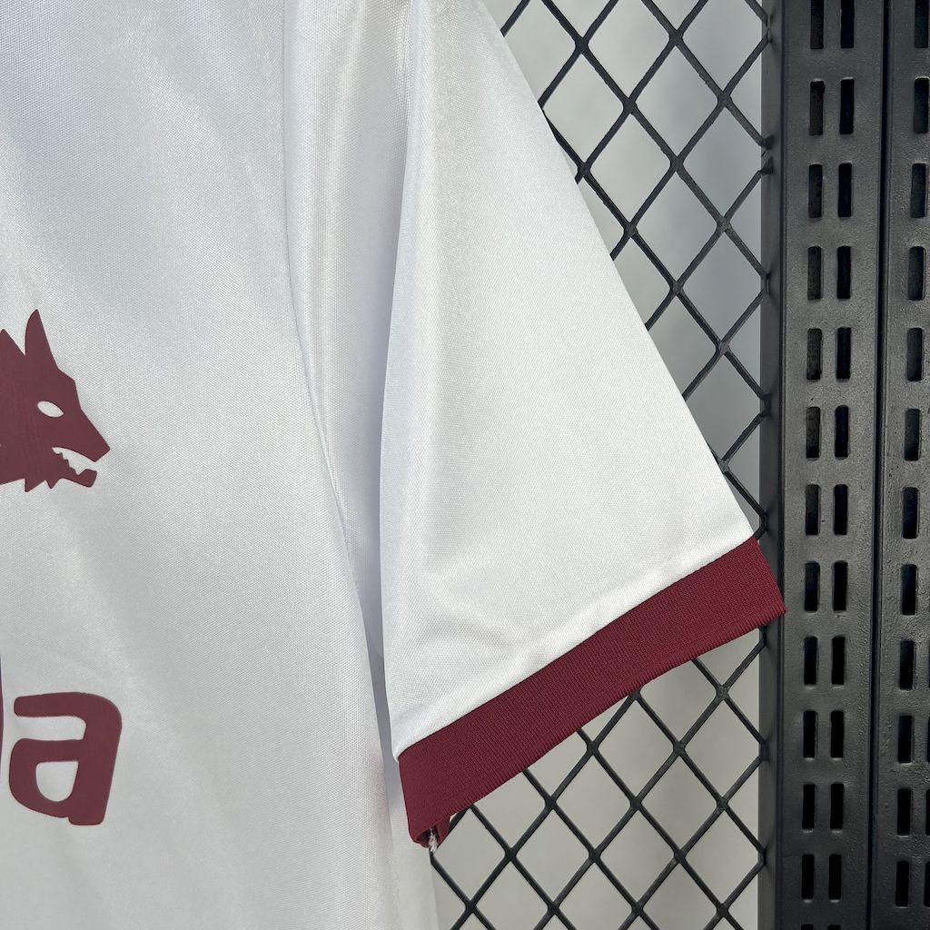 White soccer jersey sleeve with maroon hem and orange collar edge