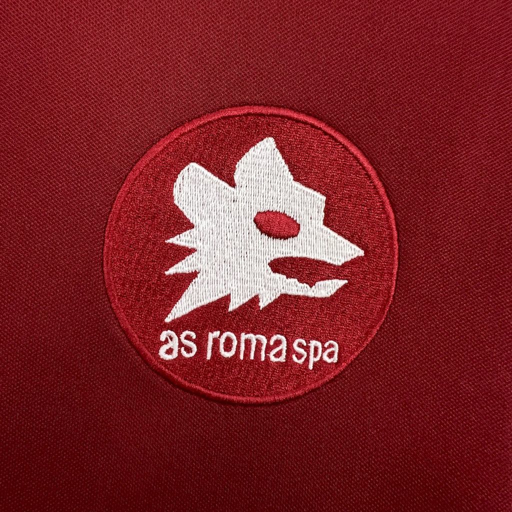 as roma spa round crest patch on maroon football jersey