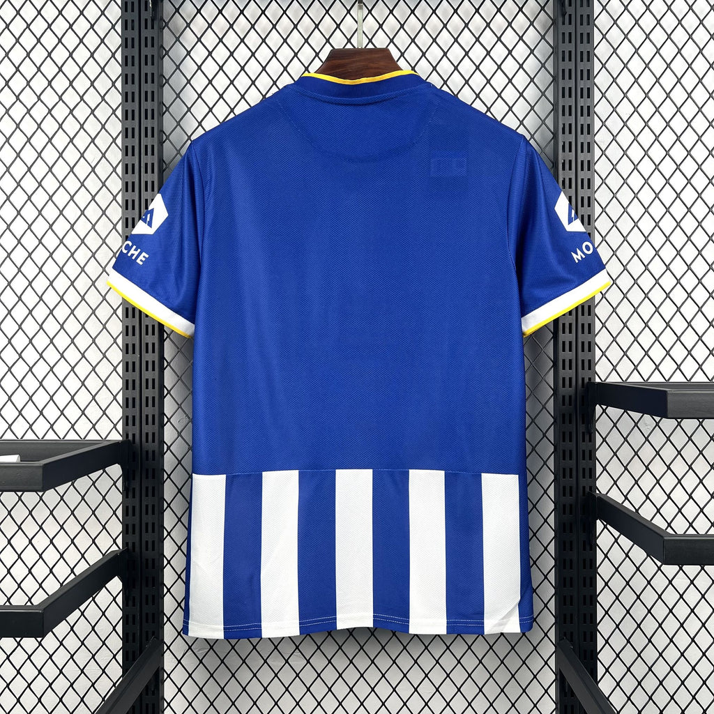Retro soccer jersey back in solid blue with white stripe hem and yellow-trim collar