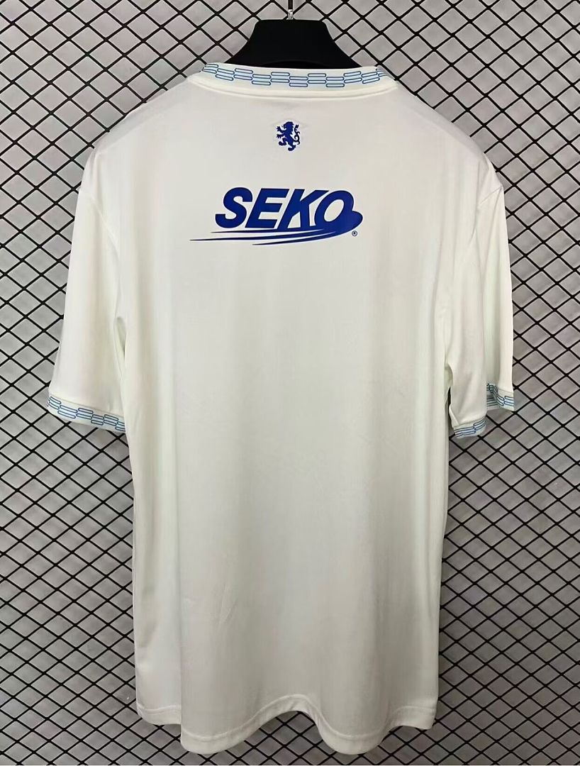 Cream Rangers away football shirt back view with blue SEK0 sponsor and striped collar trim