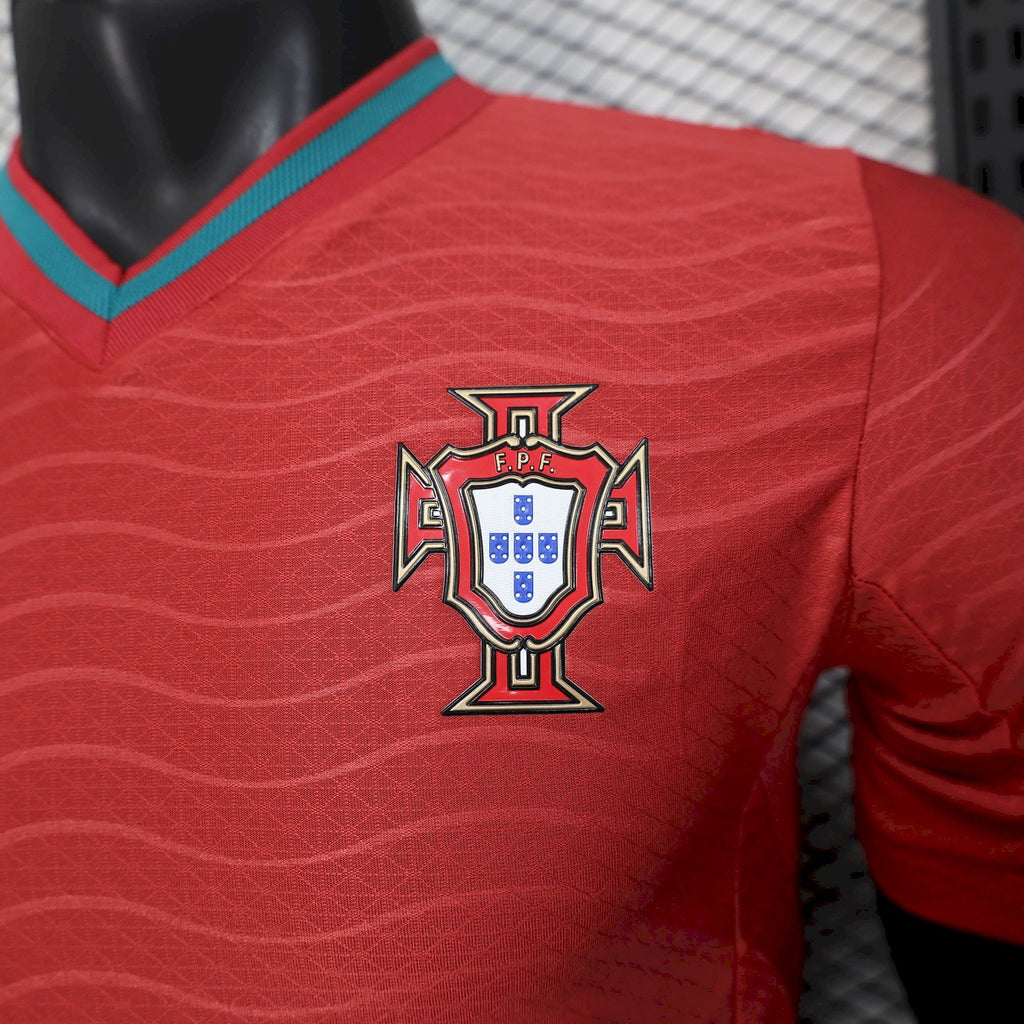 Red soccer jersey back with Portugal crest centered, teal collar trim