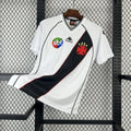 Retro football jersey with white base, black-red sash, and club crest