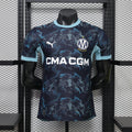 Navy away football jersey with light-blue trim and CMA CGM sponsor on front