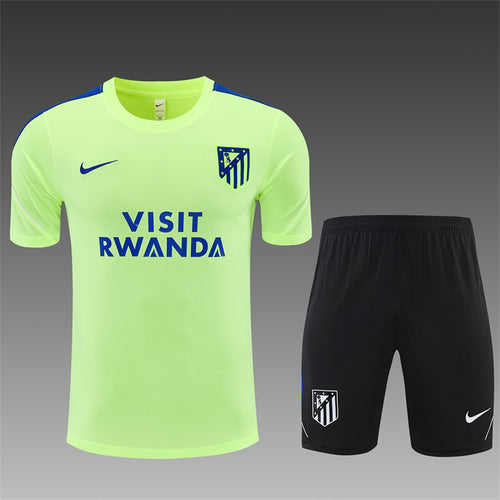Lime yellow training jersey and black shorts set, blue trim, team badge, Nike logos