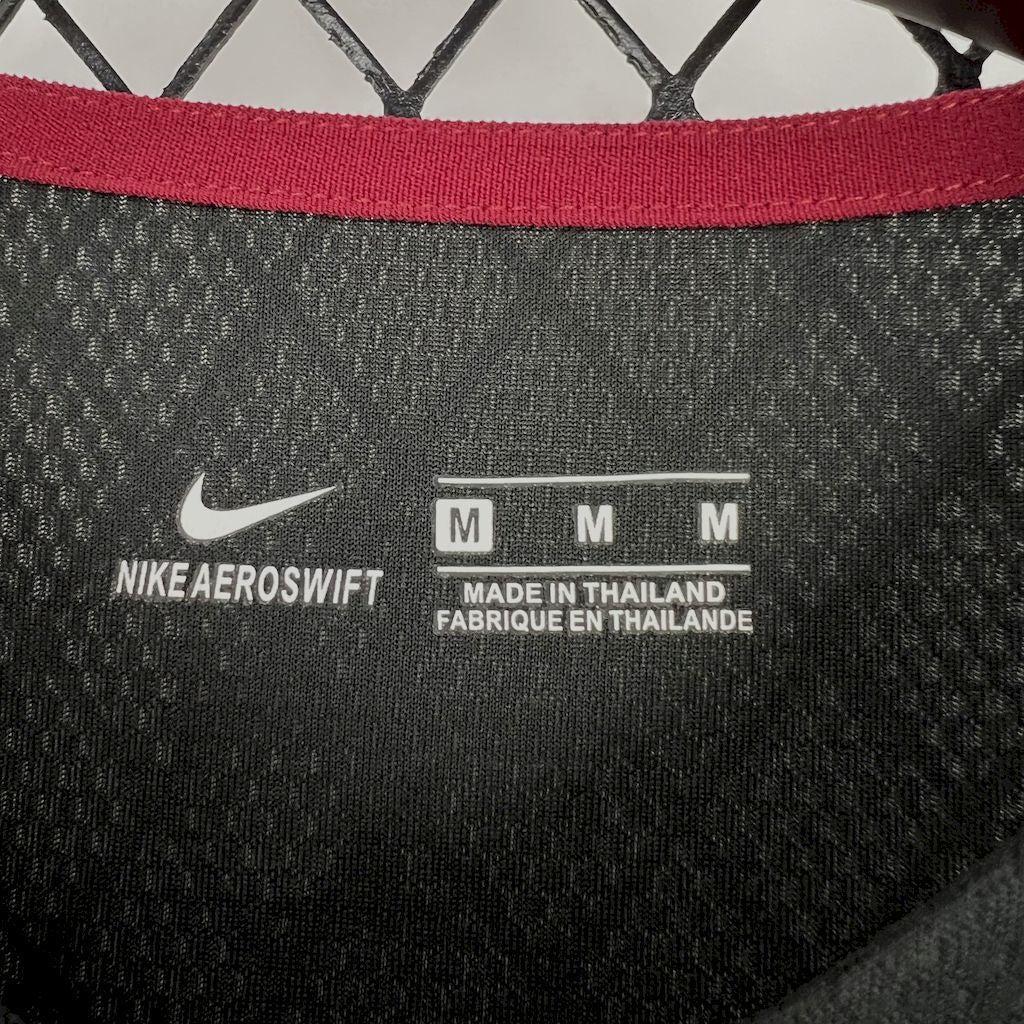 Jersey neck label: Nike AEROSWIFT, made in Thailand, size M