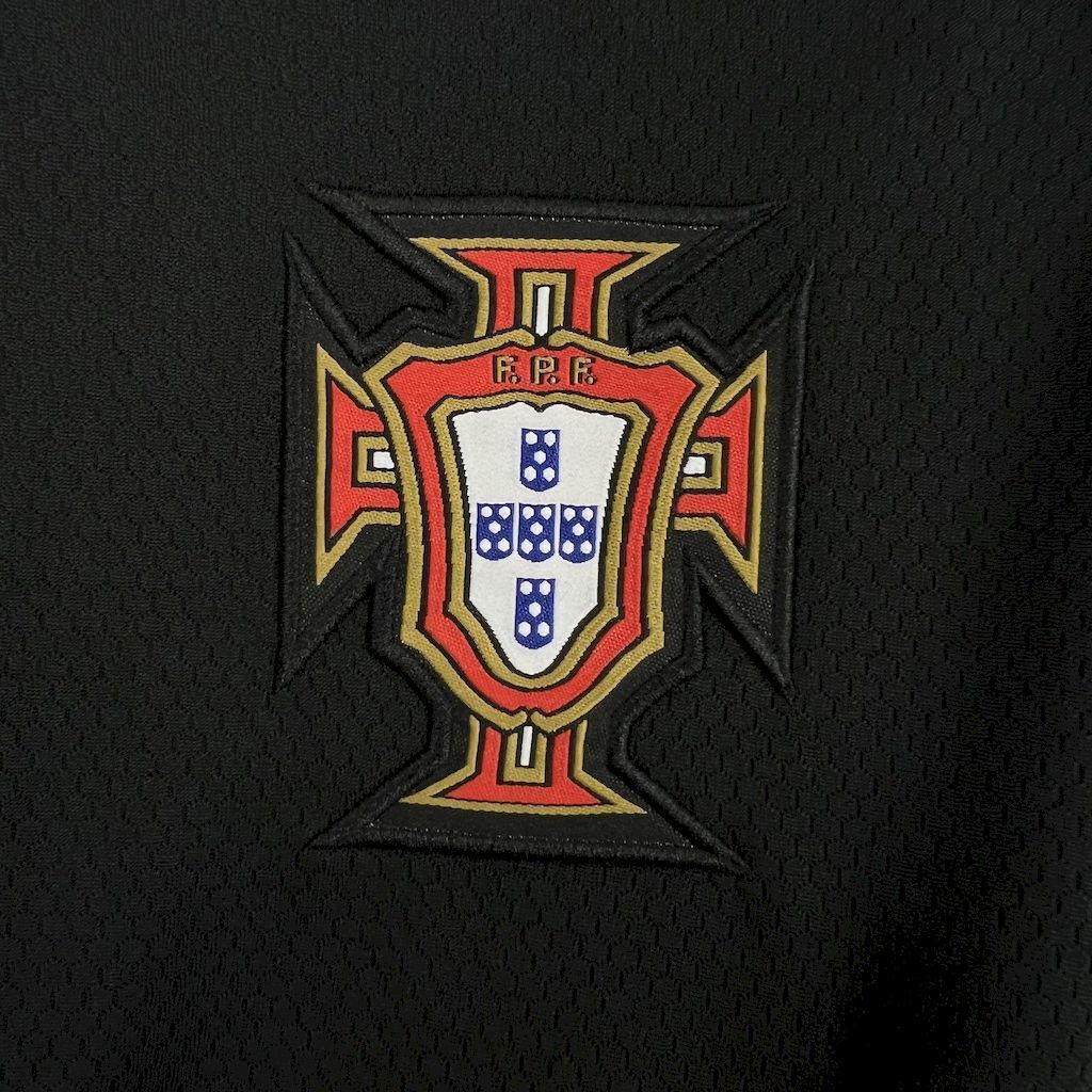 Portugal crest patch on black textured jersey