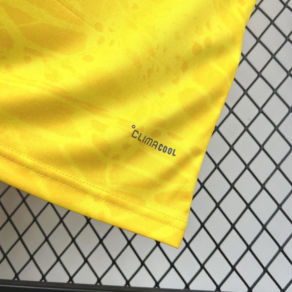 Yellow jersey cuff with ClimaCool logo and blue-trim edge.