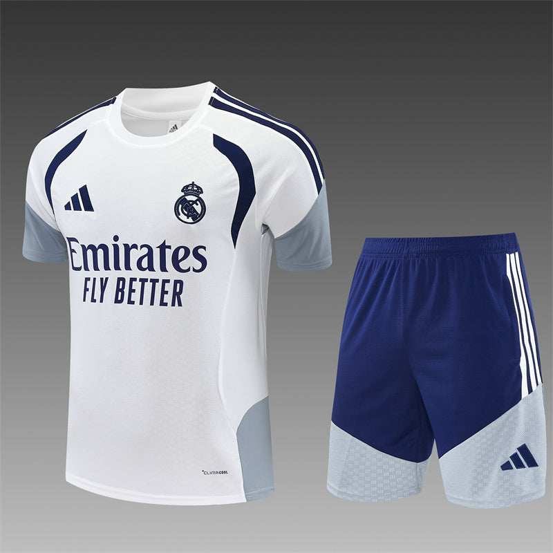 Real Madrid white training shirt and blue shorts set with crest and side stripes