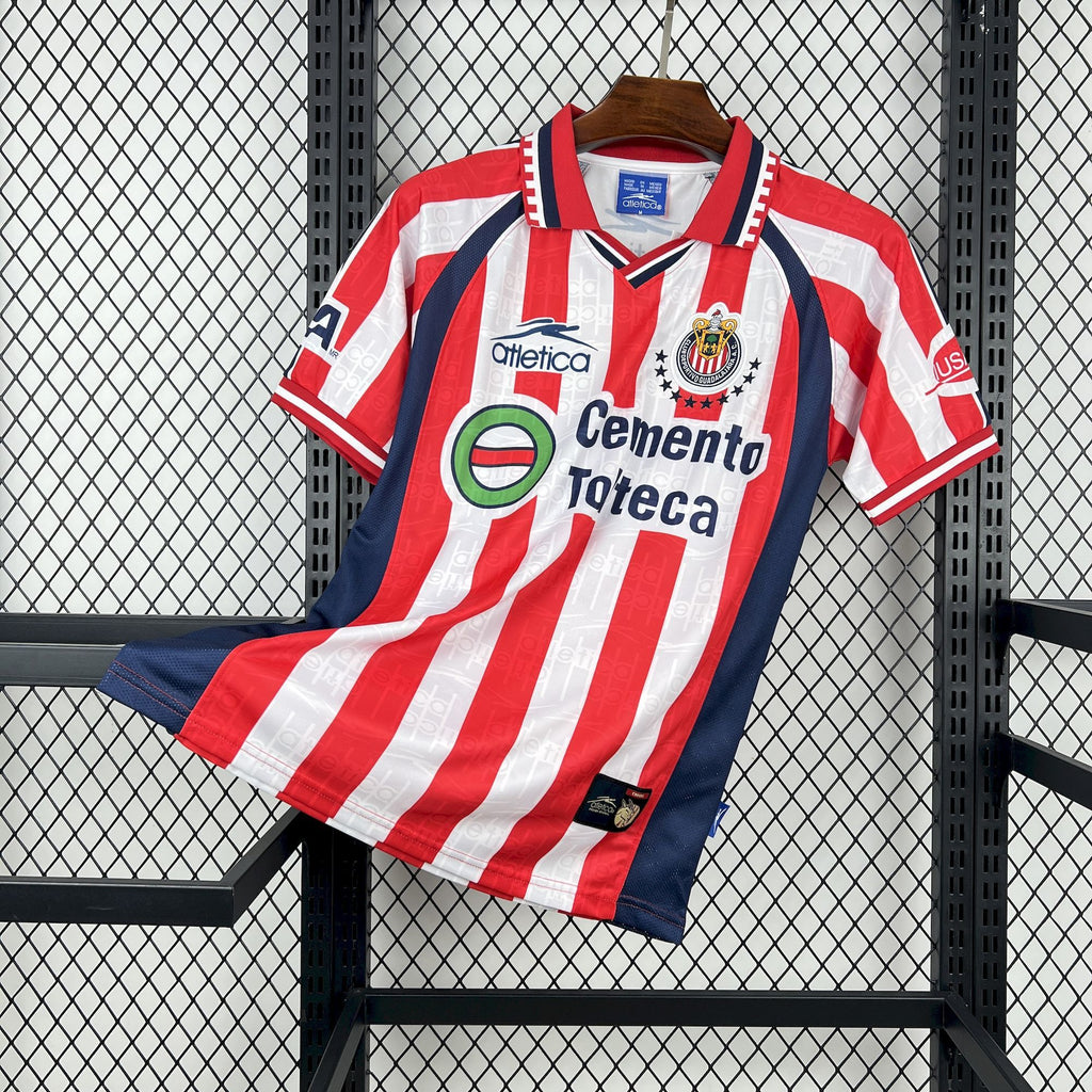 Retro home soccer jersey with red, white, and blue vertical stripes and red collar