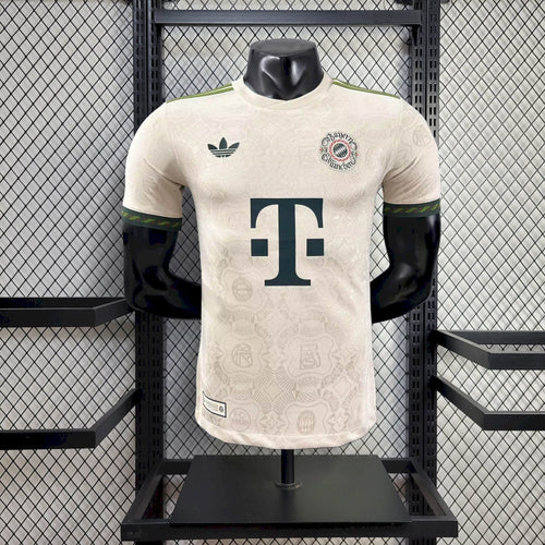 White Bayern Munich Oktoberfest player jersey with green sleeve trim and sponsor logo T