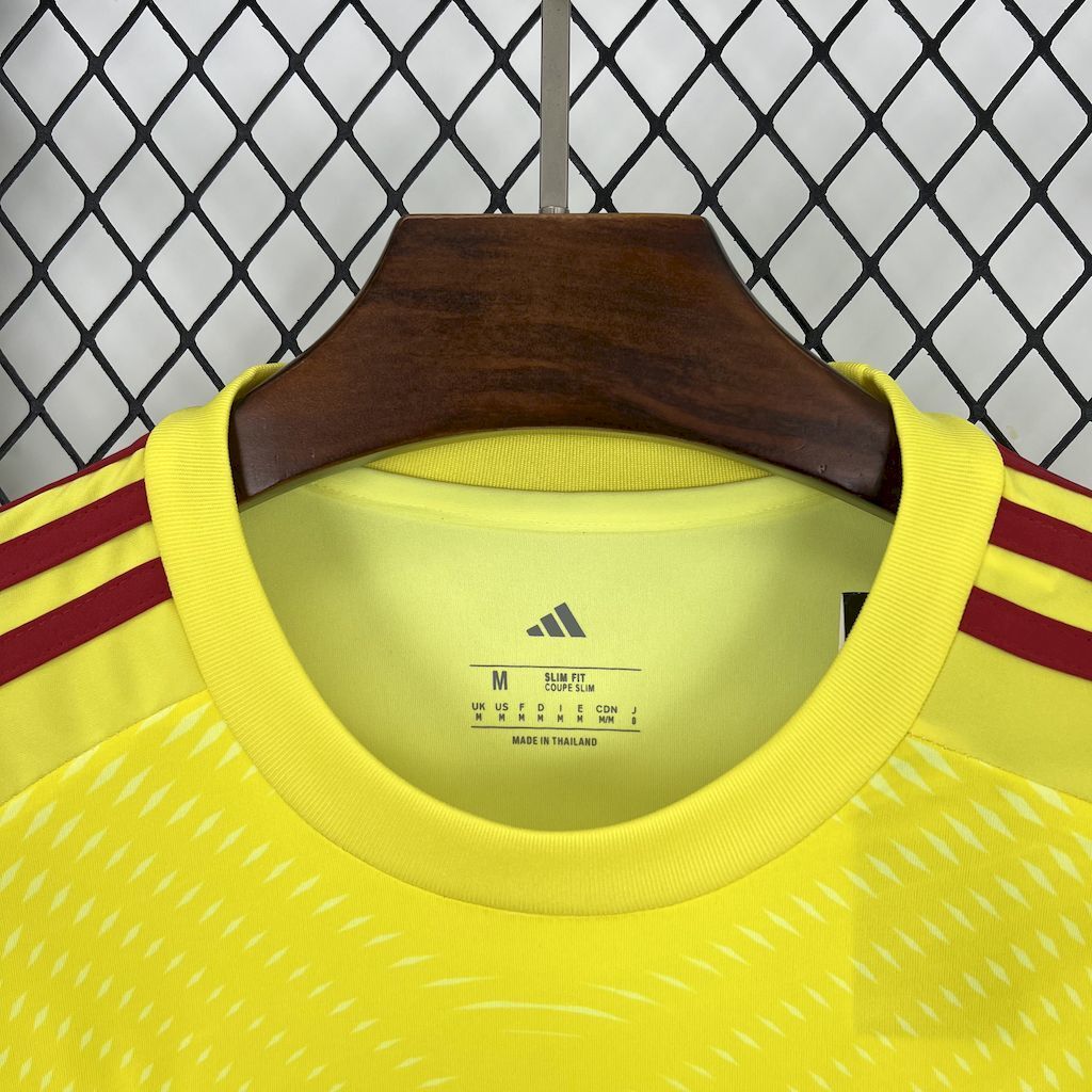 Neon yellow goalkeeper jersey collar with Adidas logo and size label