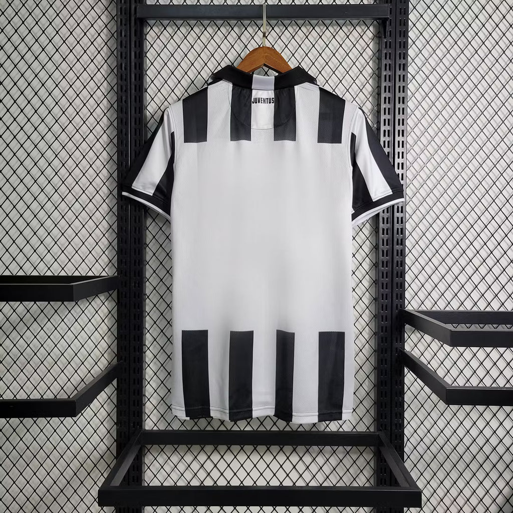 Black accents on white Juventus soccer jersey back with vertical stripe panels