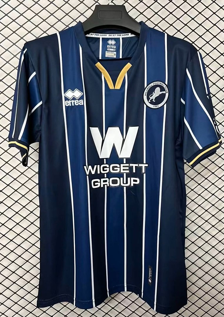 Navy football home shirt with white vertical stripes, yellow V-collar, short sleeves