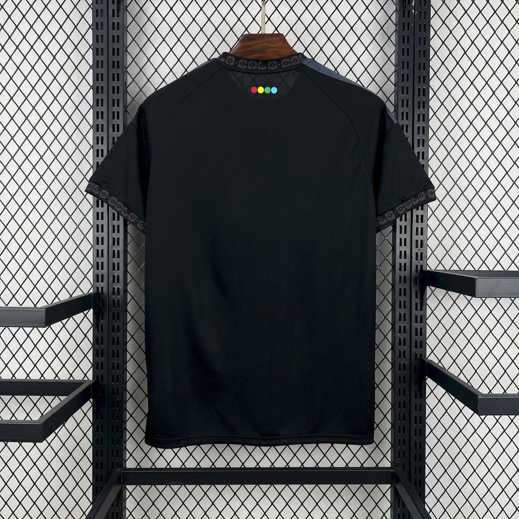 Black away football jersey back view with multicolor neck dots and Adidas trim
