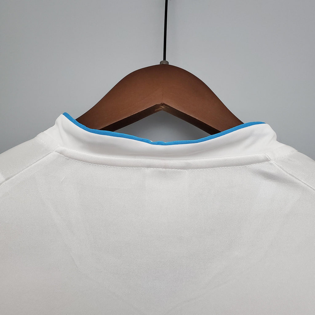 White jersey collar with blue trim and hidden button placket