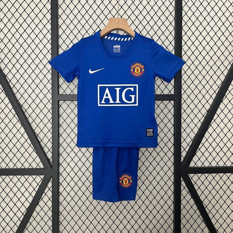 Blue Manchester United kids retro jersey and shorts set with AIG sponsor and crest