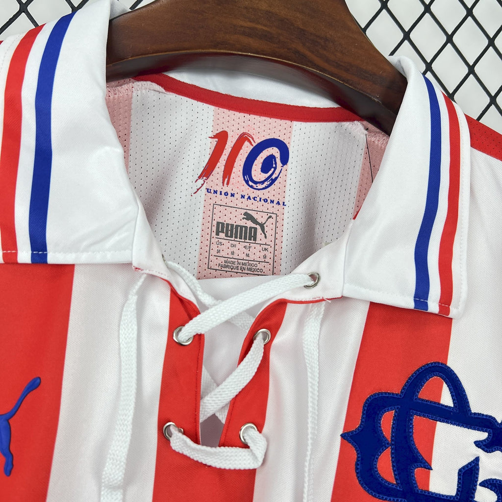 Retro soccer jersey collar close-up with drawstring and “110” anniversary Union Nacional label.