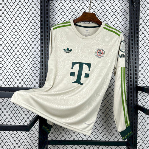 White long-sleeve Bayern Munich Oktoberfest fan jersey with green trim and crest