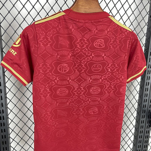 Maroon kids jersey back with textured crest pattern and yellow-trim shoulder stripes
