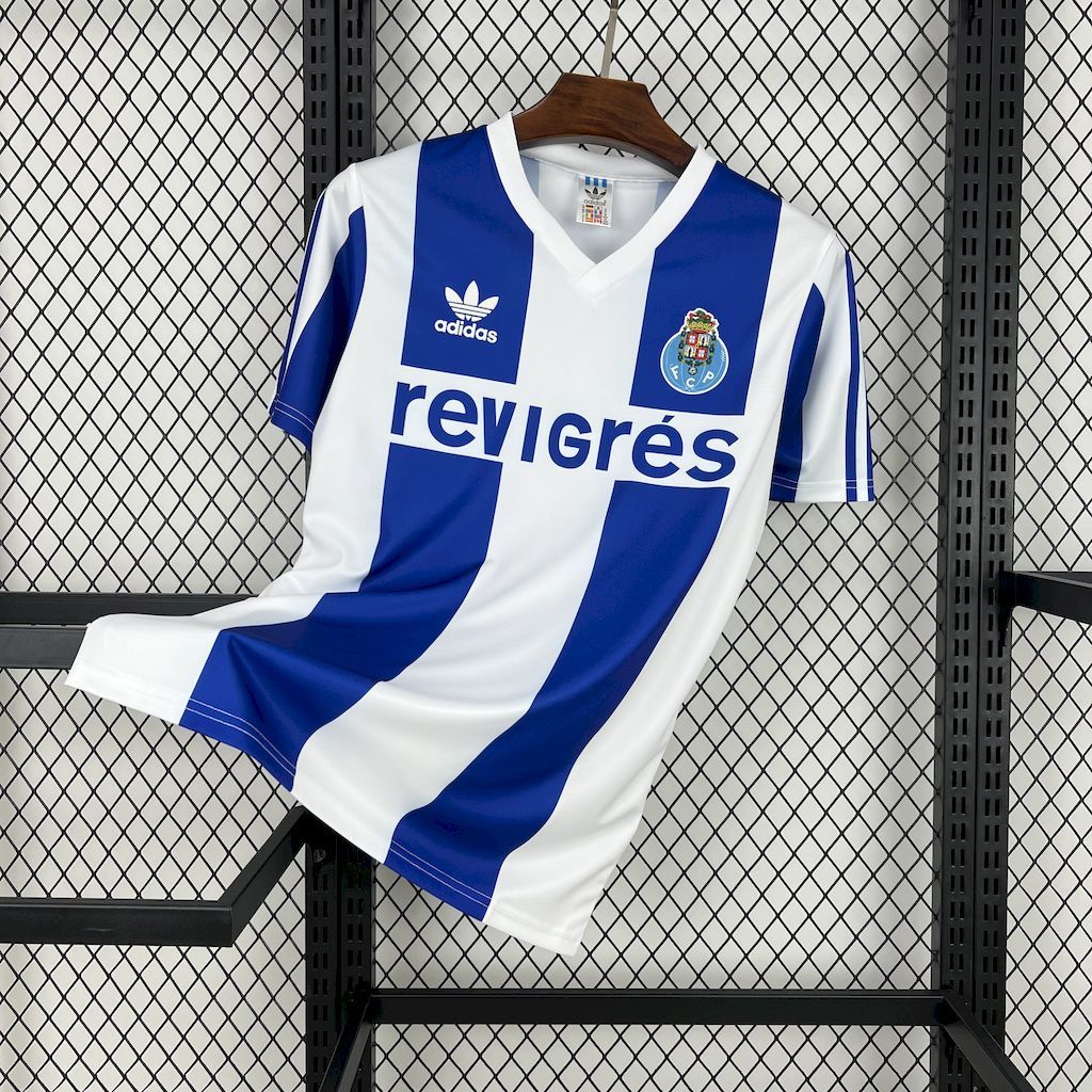 Blue/white striped retro home football jersey with Adidas logo, crest, and sponsor print