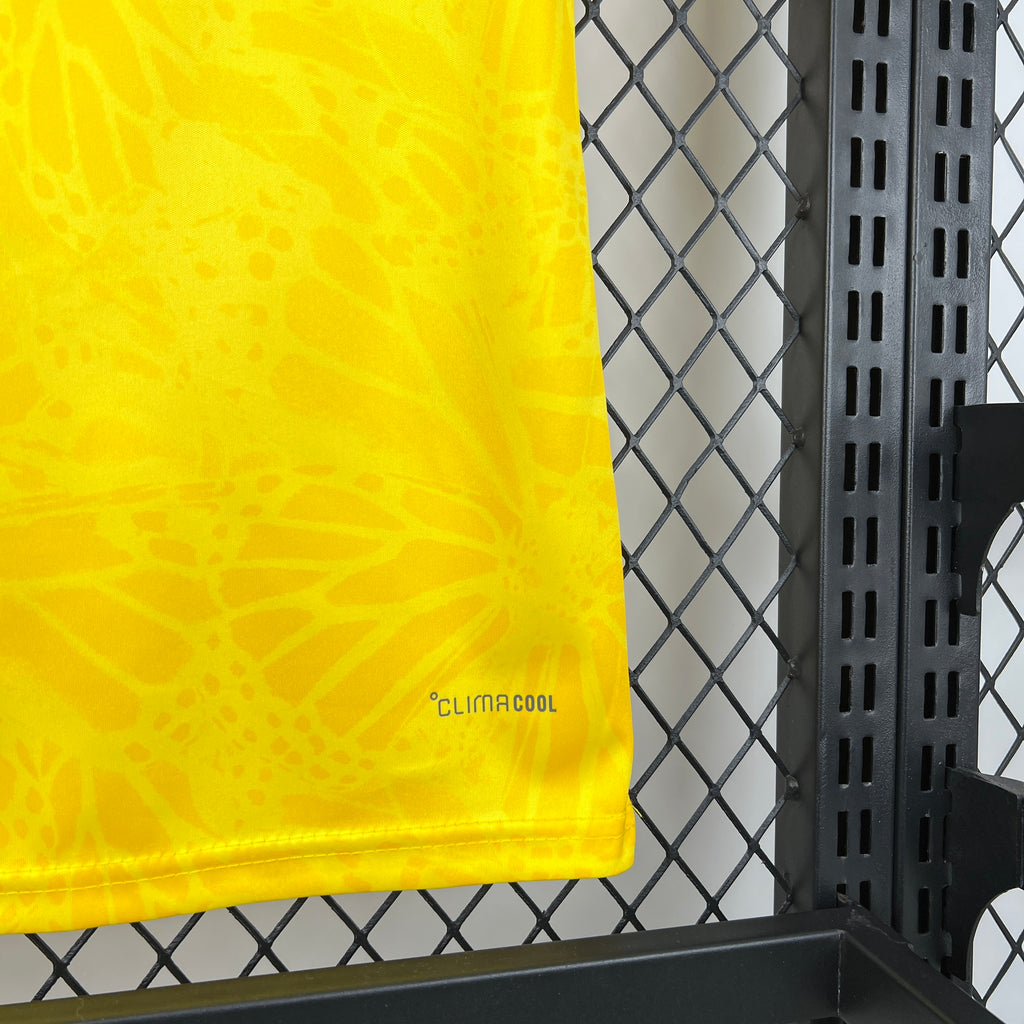 Yellow jersey hem with climacool logo