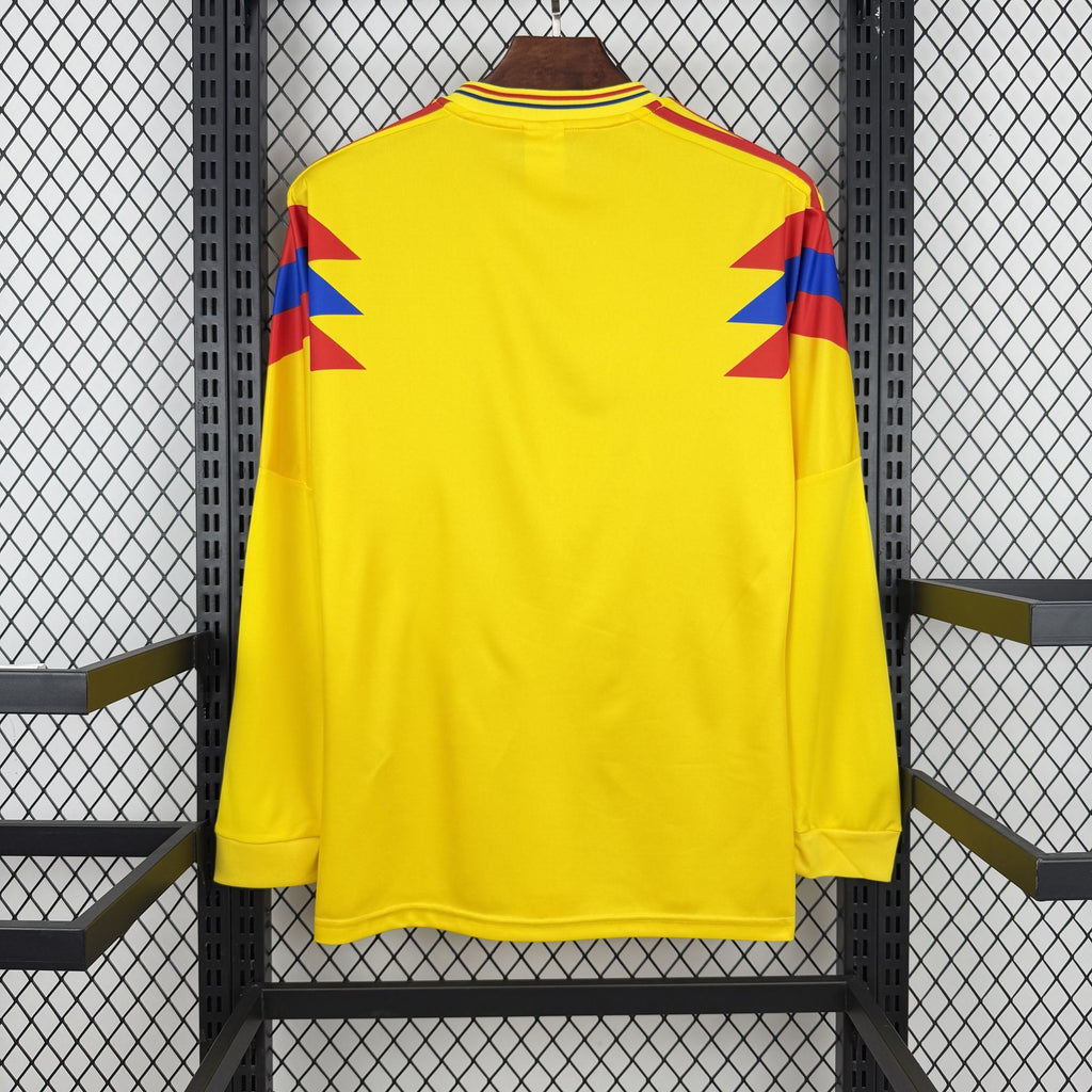 Yellow long-sleeve Colombia home soccer jersey, back view with red/blue shoulder panels
