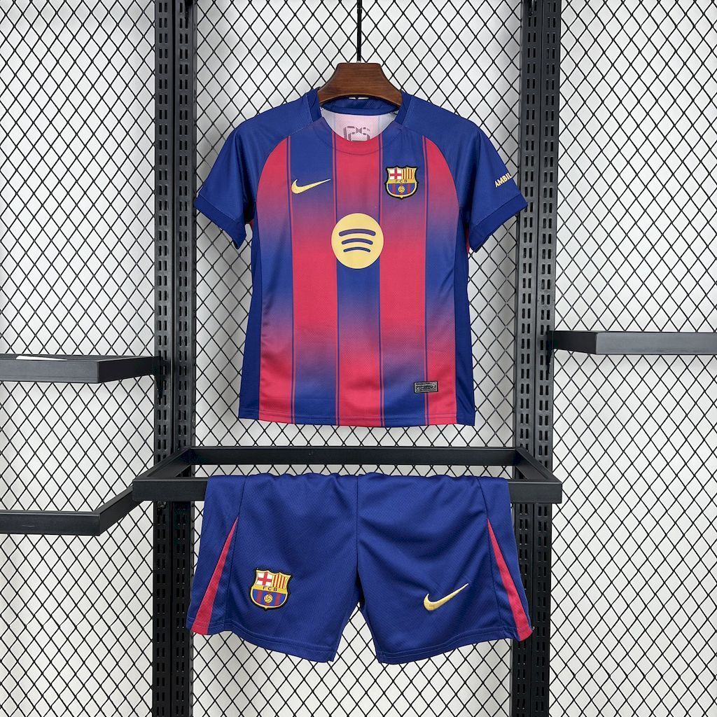 Kids FC Barcelona home soccer kit: blue jersey with red-blue vertical stripes and blue shorts